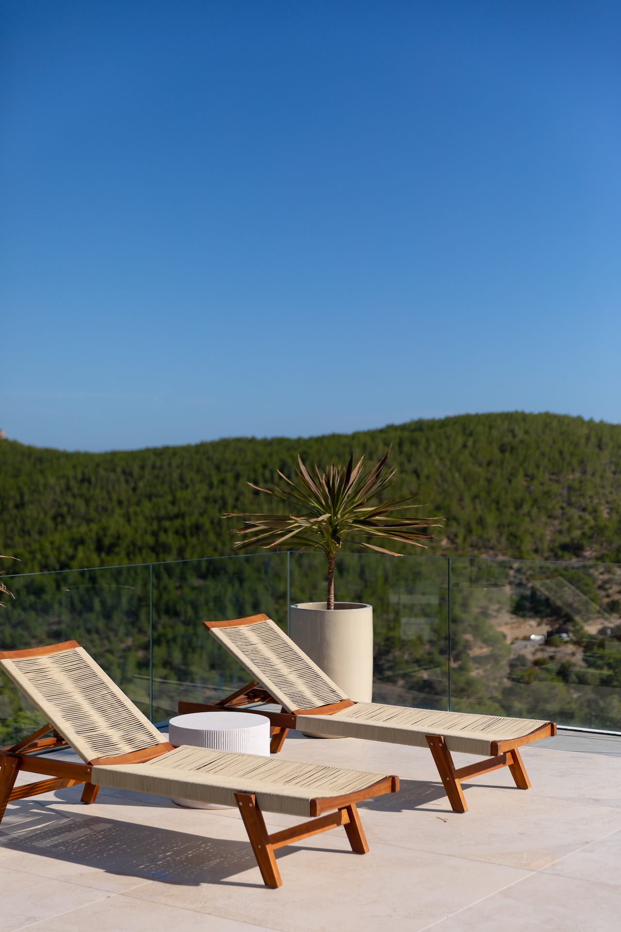 Resa Estates for sale Ibiza Vlla Aixa te koop sale lift sea views exterior day beds.jpg